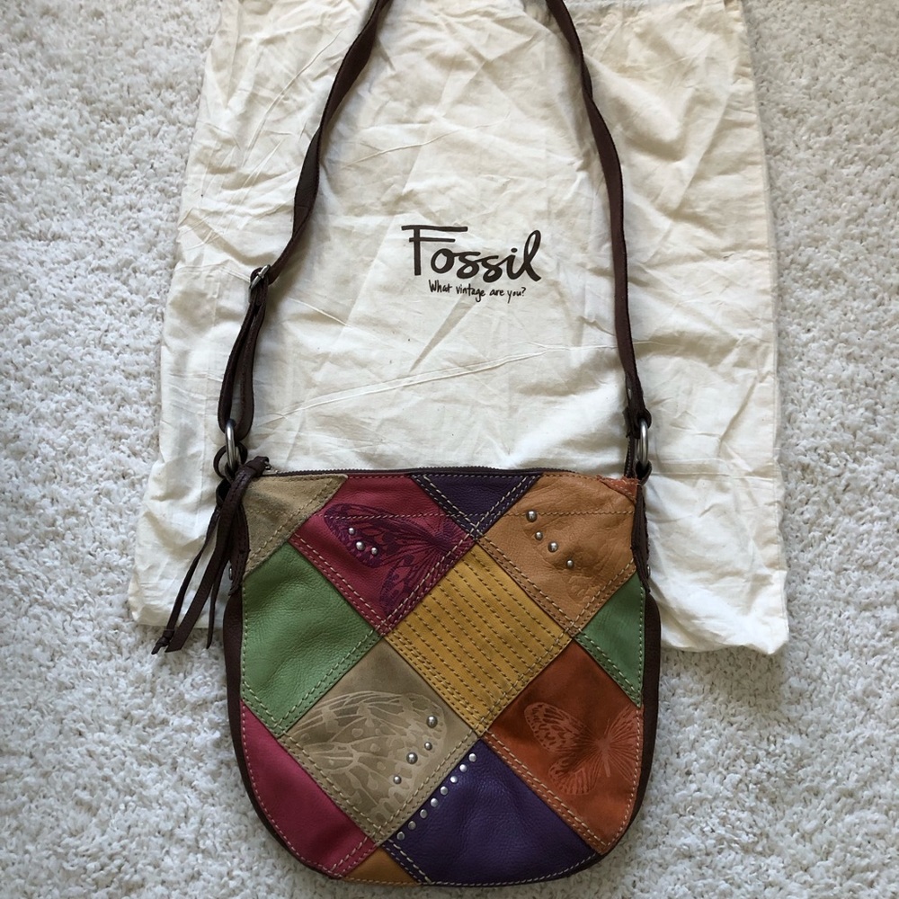 Original Fossil suede bag multi color with butterfly design used like new